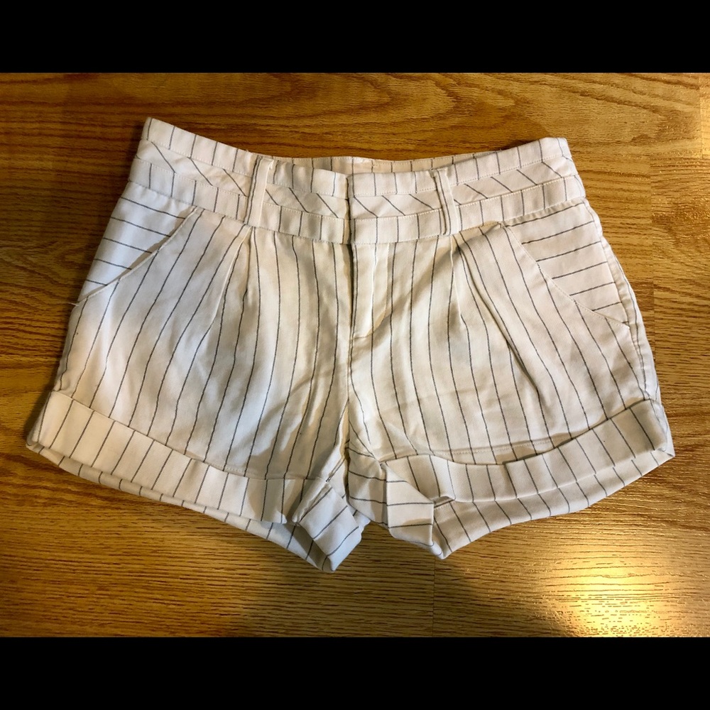 white pinstripe Bebe shorts size: 25/26